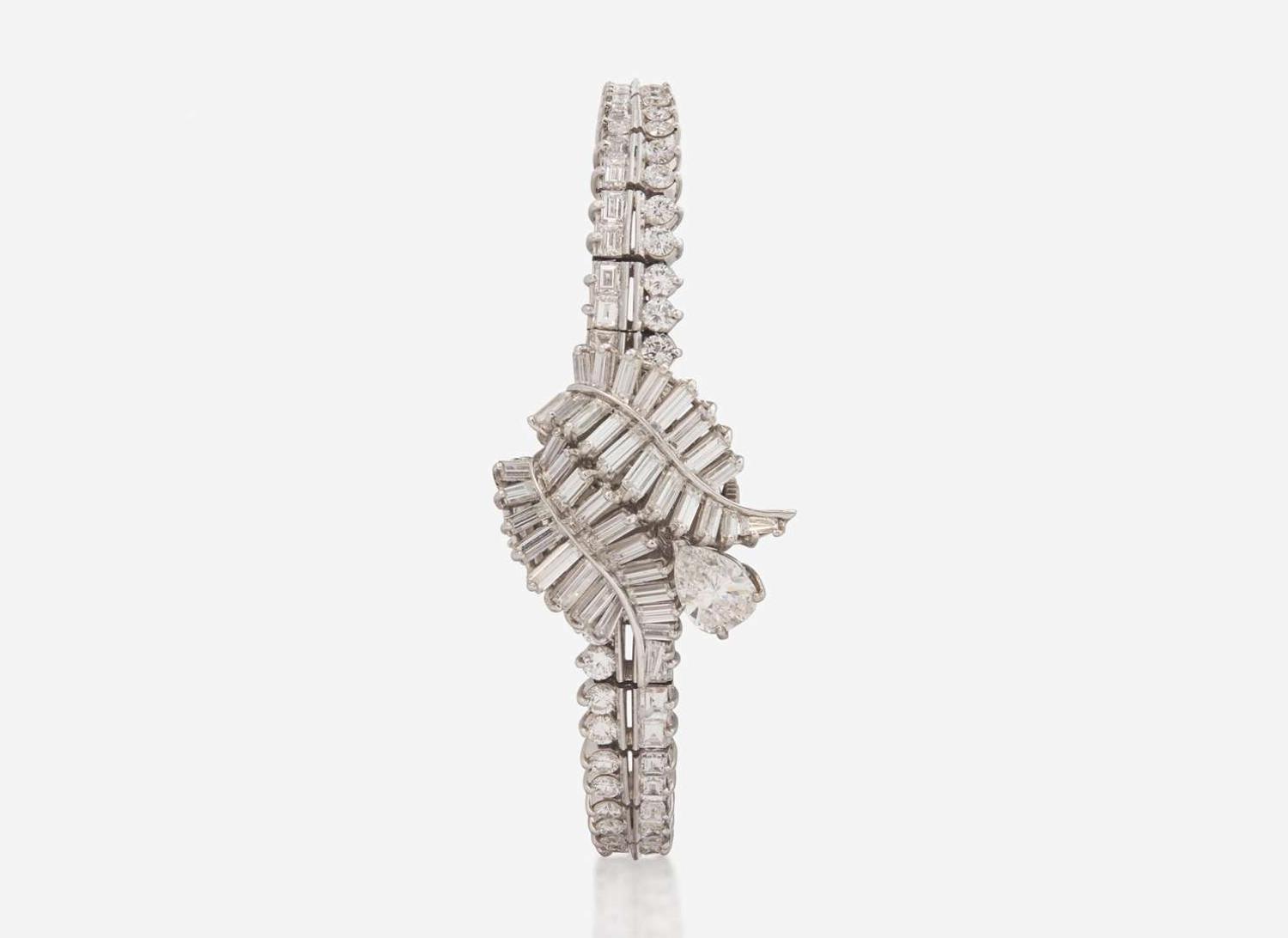 A Ladies Hidden Dial Platinum and Diamond Omega Watch
