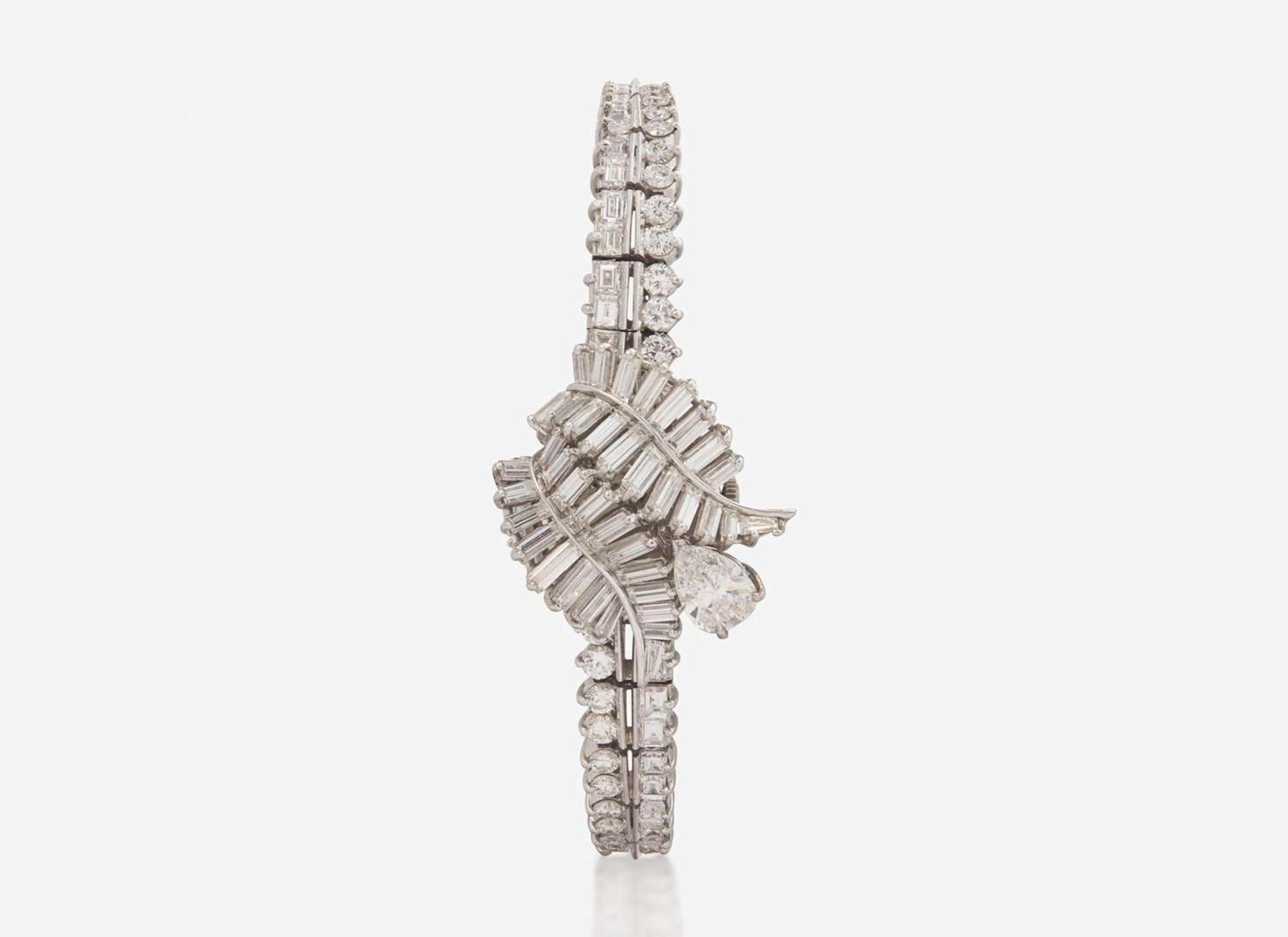 A Ladies Hidden Dial Platinum and Diamond Omega Watch