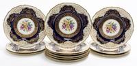 Twelve Black Knight Service Plates Diameter 10 3/8 inches. — FIRST HALF 20TH CENTURY