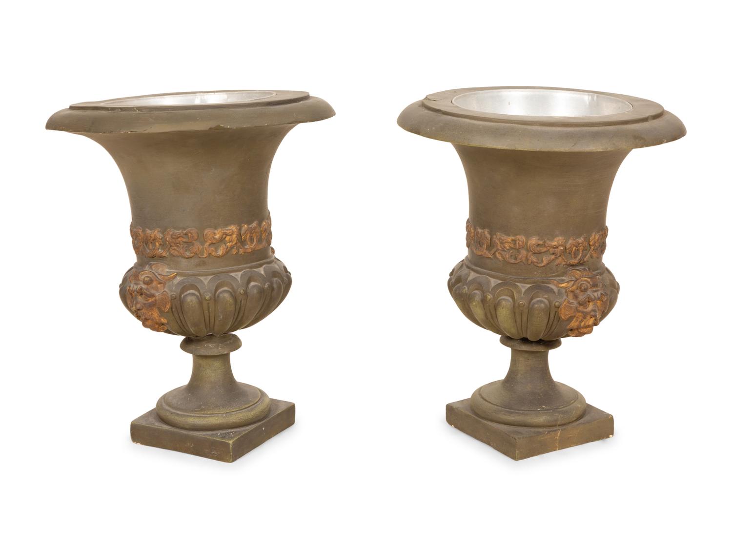 A Pair of Campana Form Painted and Parcel Gilt Ceramic Urns