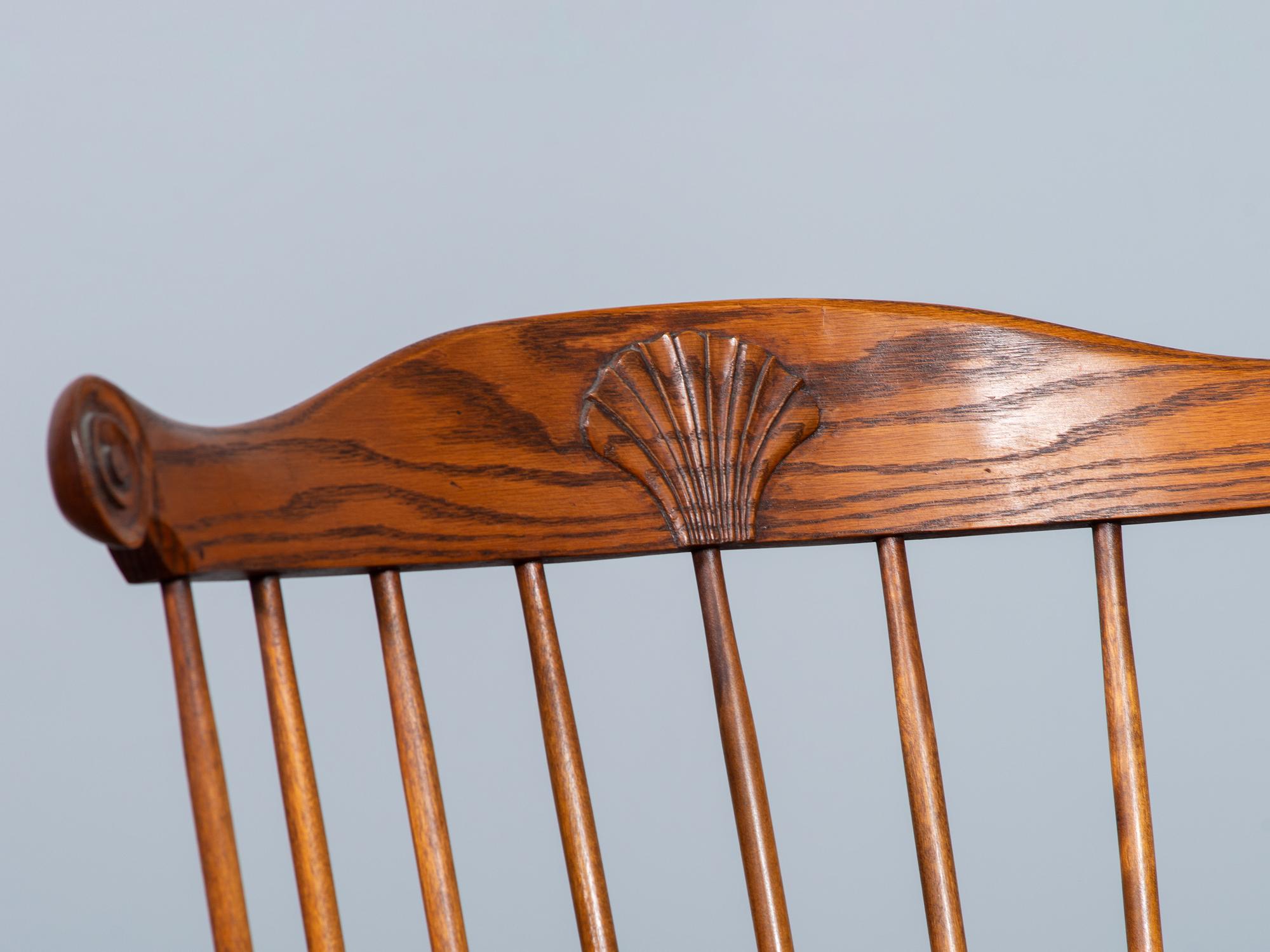 A D.R. Dimes Benchmark Turned and Volute Carved Tiger Maple and Pine Comb-Back Windsor Armchair