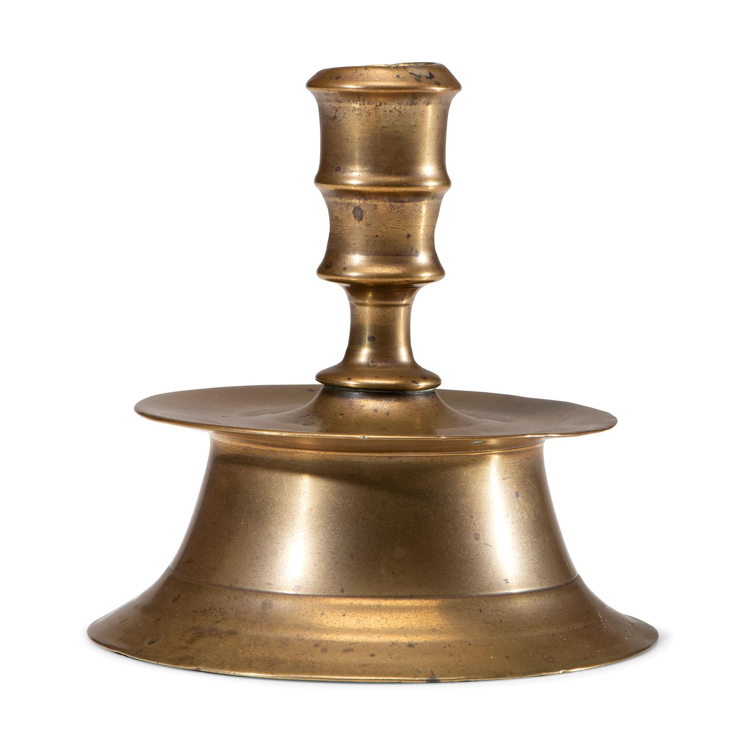 A Dutch Brass Heemskirk Candlestick