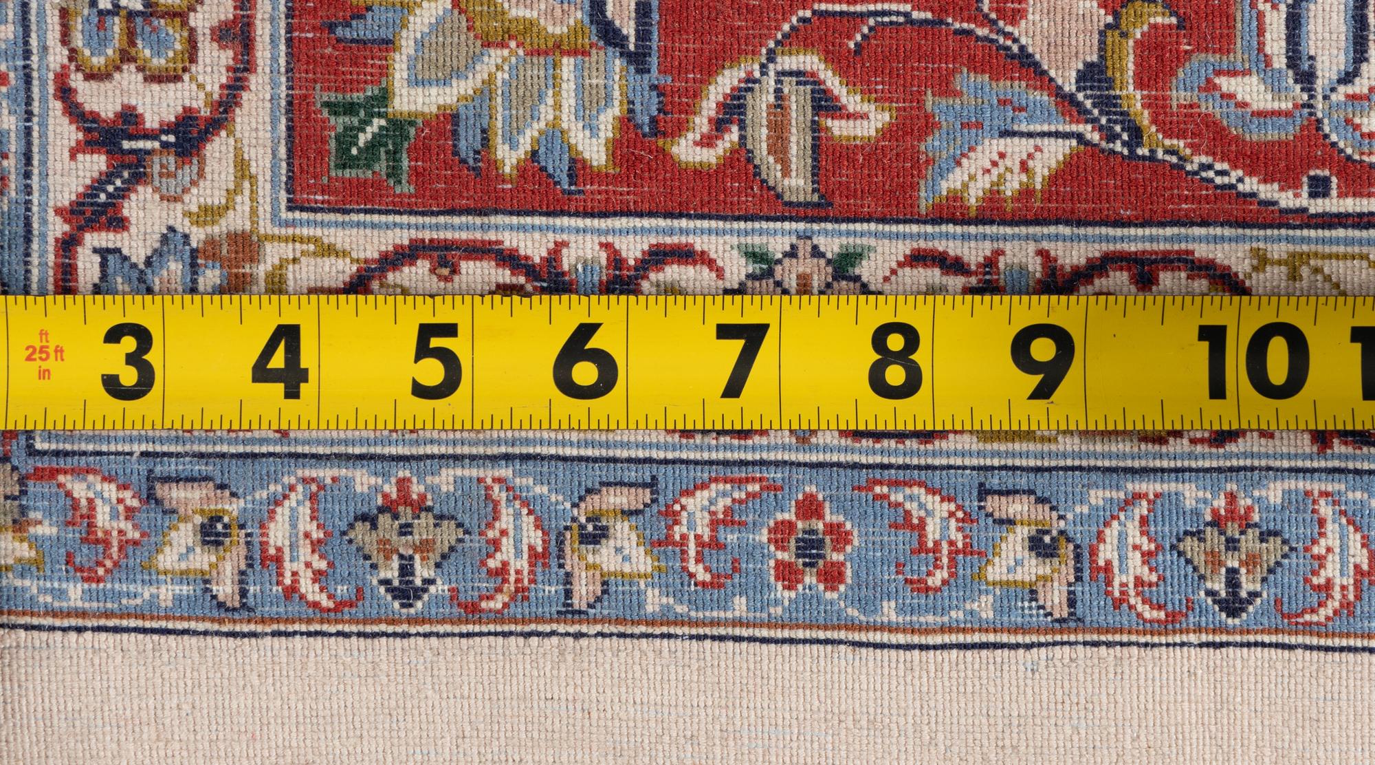 A Tabriz Wool Rug