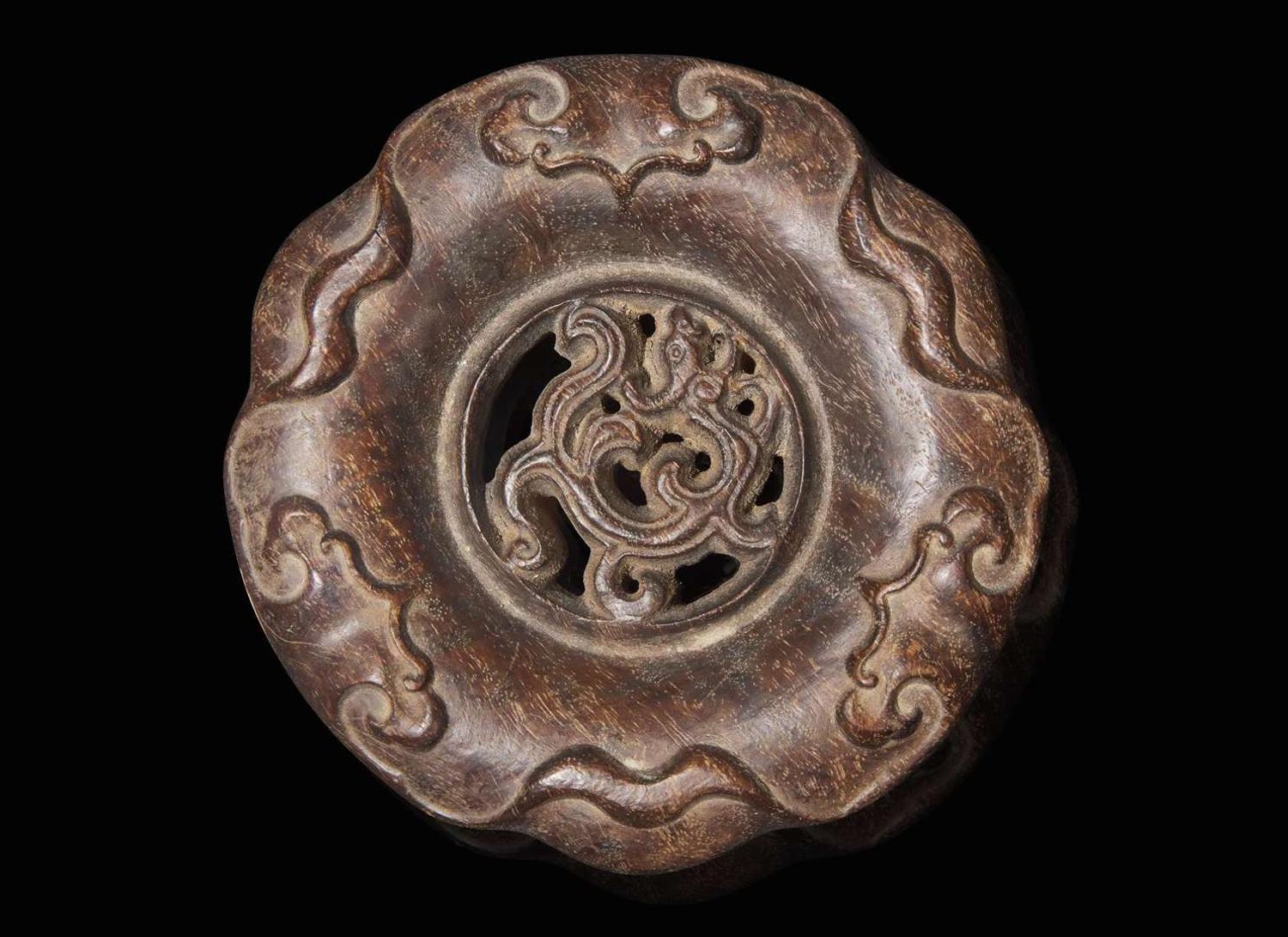 A carved Chinese hardwood censer stand, possibly Tieli Mu 硬木底座 可能為鐵梨木
