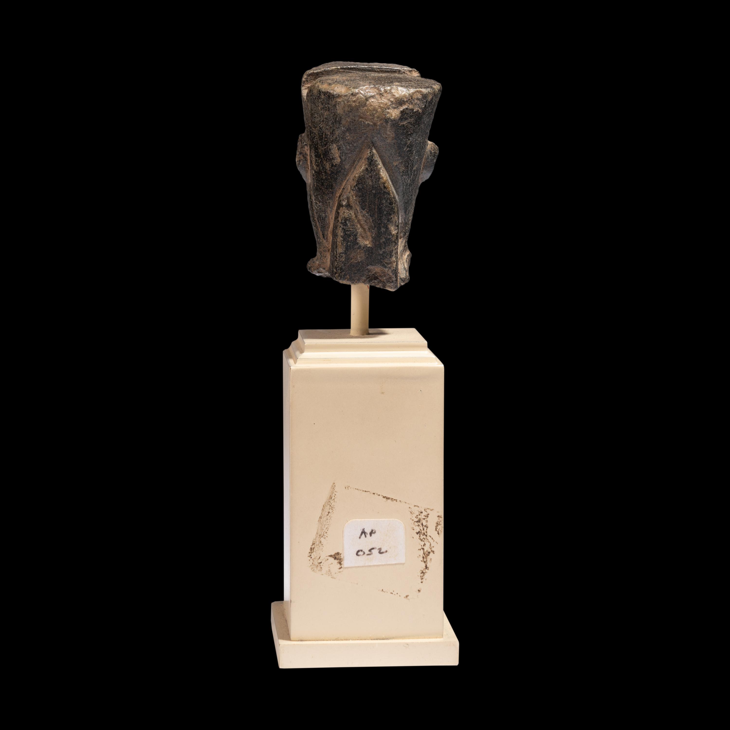 An Egyptian Stone Head of Amun