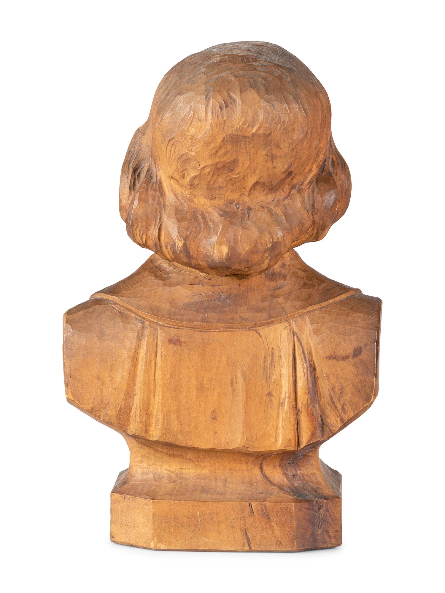 A Carved Wood Bust of a Man, Possibly St. John Vianney