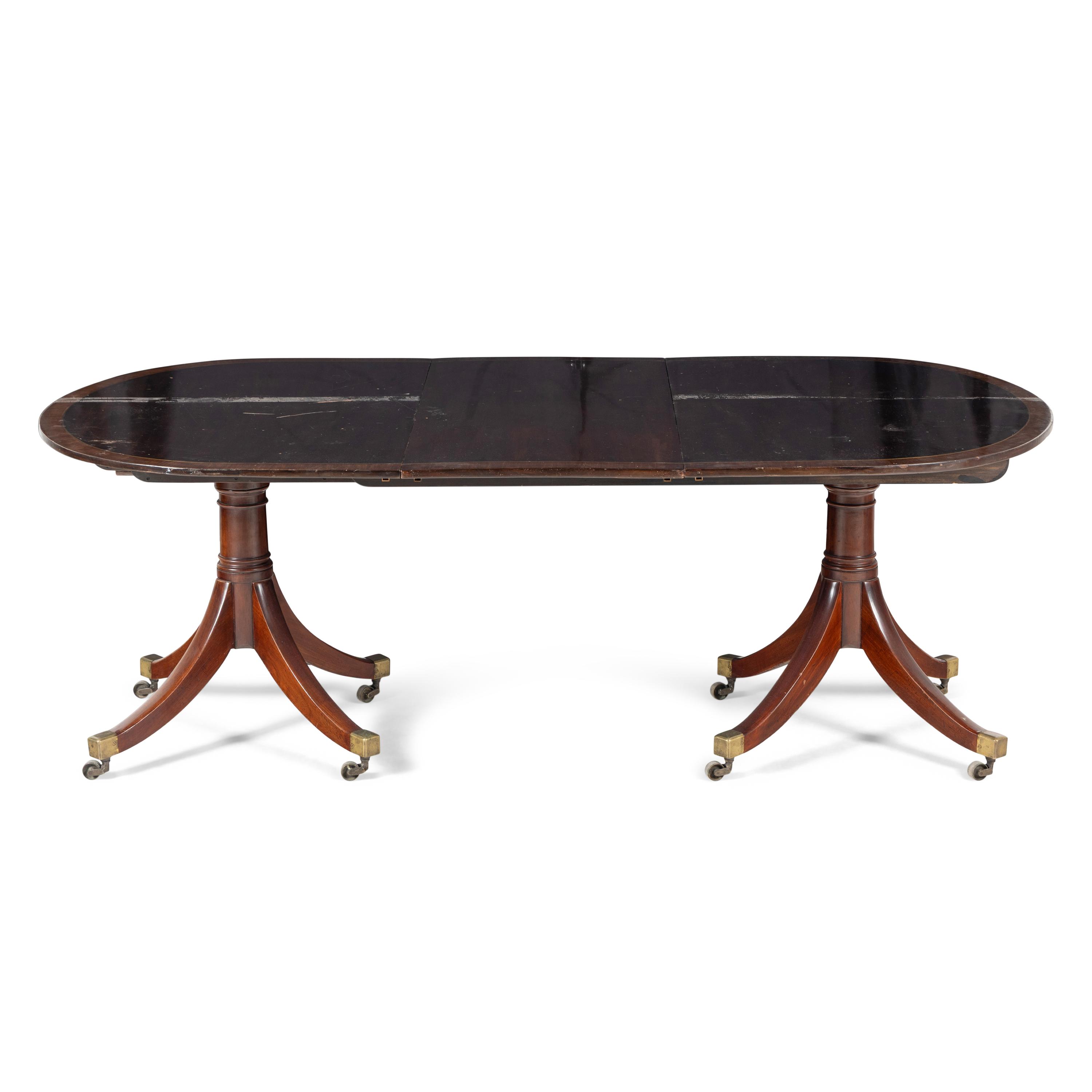 A George III Style Brass Inlaid Mahogany Dining Table