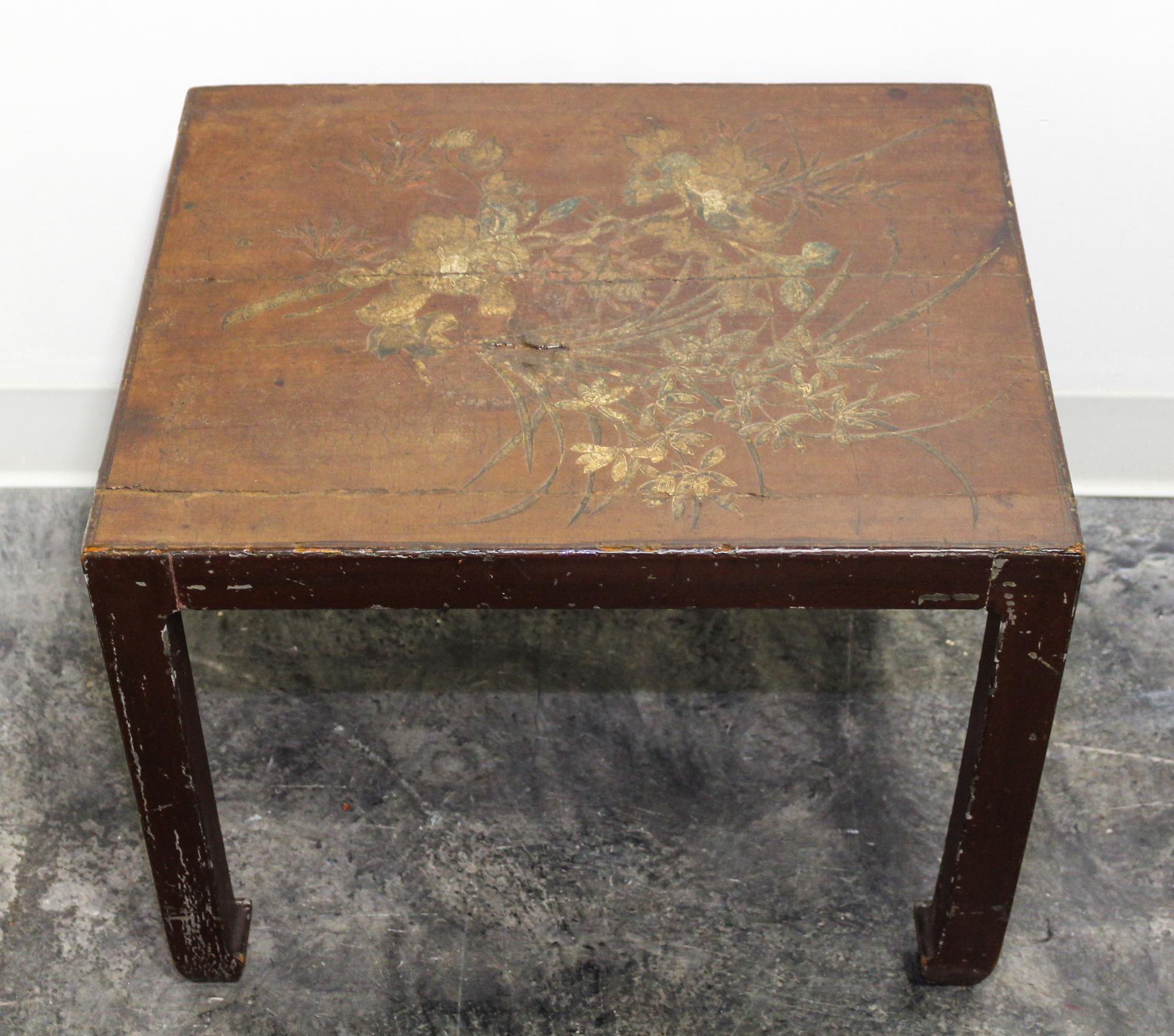 A Chinese Lacquered Side Table Height 16 1/2 x width 21 1/4 x depth 17 1/2 inches.