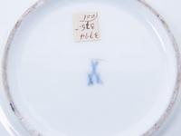 Three Meissen Painted and Parcel Gilt Porcelain Cup and Saucer Sets, a Covered Cup and Two Spoons