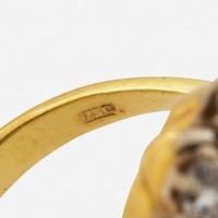 An 18K Yellow Gold, Platinum, Diamond, and Yellow Sapphire Ring