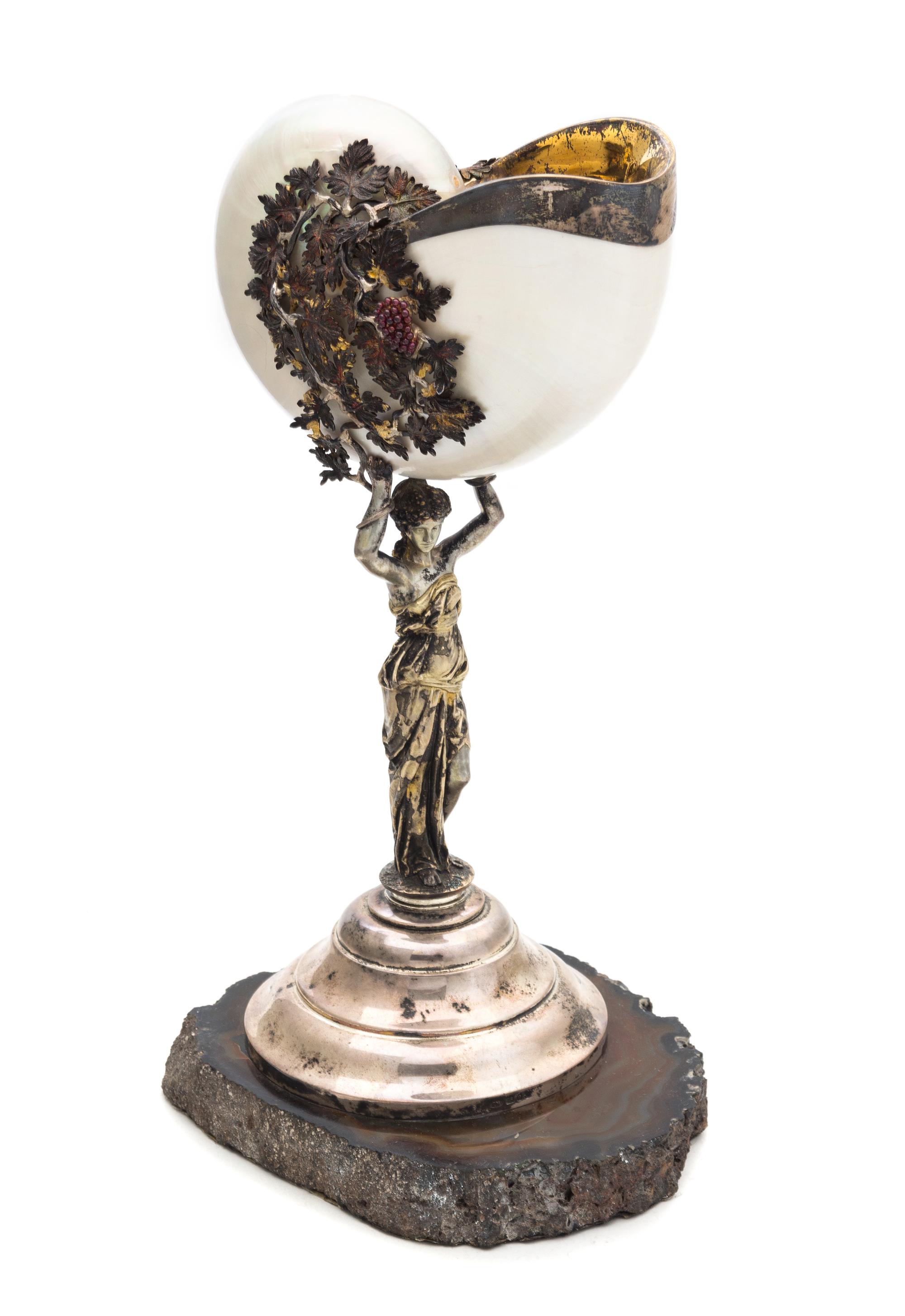 An Elizabeth II Parcel-Gilt Silver Mounted Nautilus Shell, Peter Nicholas, London, 1992, the shell mounted with grapevines and supporte