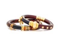 LA NOUVELLE BAGUE, PAIR OF STERLING SILVER, YELLOW GOLD-TOPPED SILVER AND ENAMEL BANGLE BRACELETS