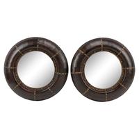A Pair of Embossed Leather-Framed Mirrors