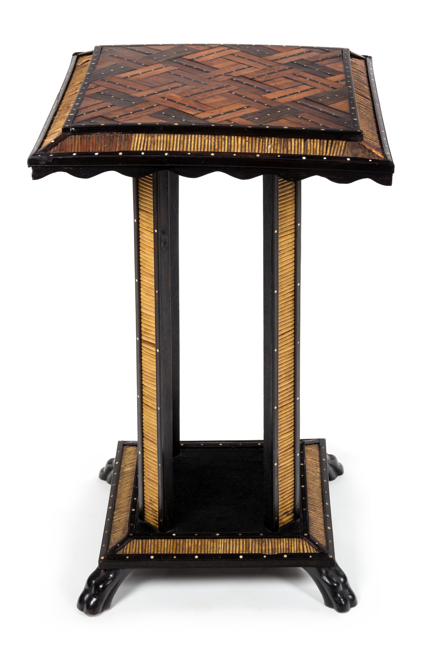 An Anglo-Indian Ebony, Quillwork and Specimen Wood Occasional Table Height 25 x width 16 depth 16 inches. — 19TH/20TH CENTURY