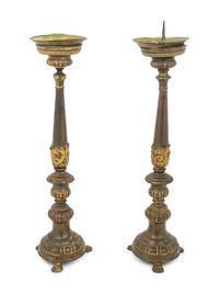 A Pair of Continental Gilt Metal Pricket Sticks