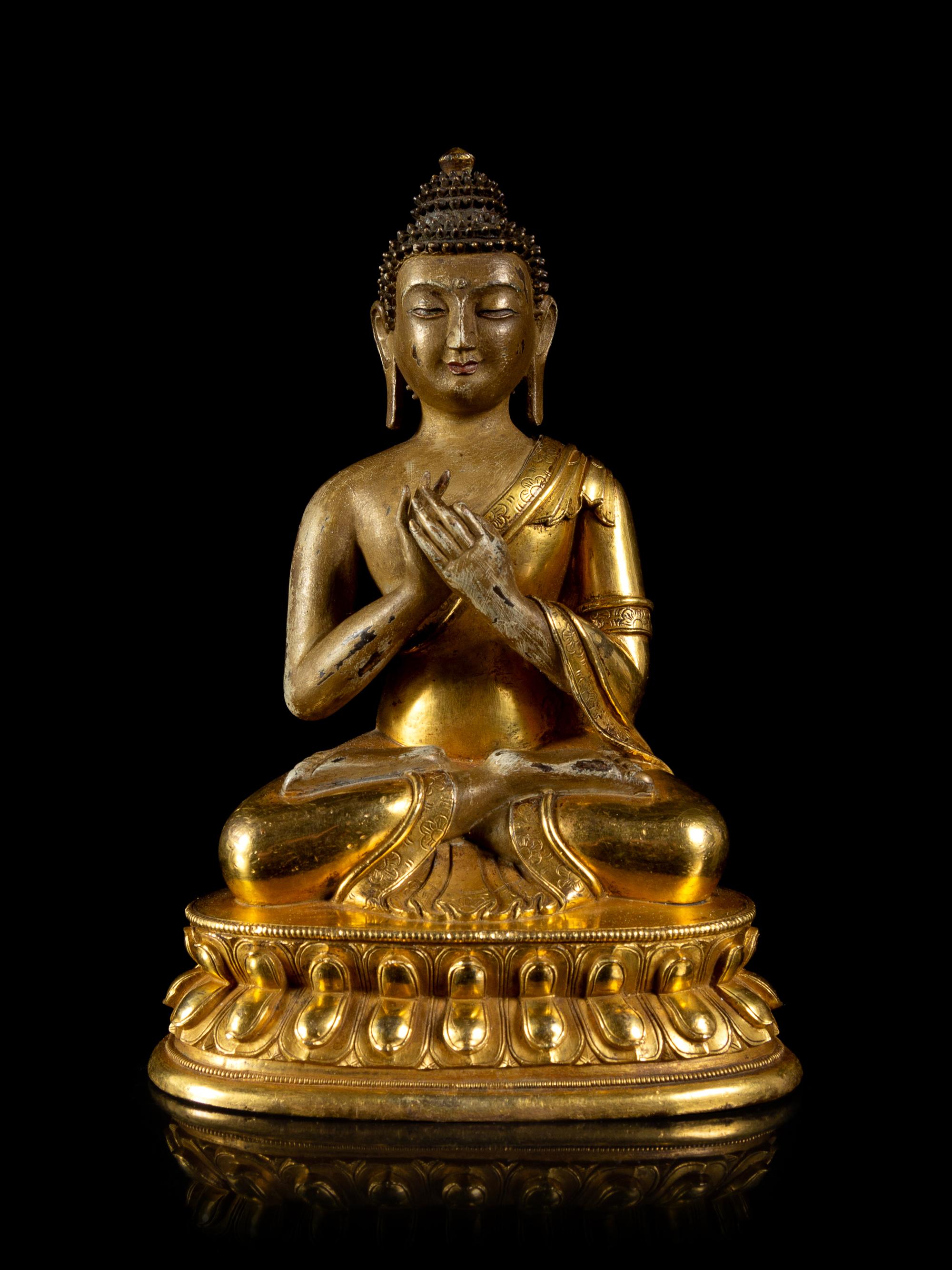 A Sino-Tibetan Gilt Bronze Figure of Buddha