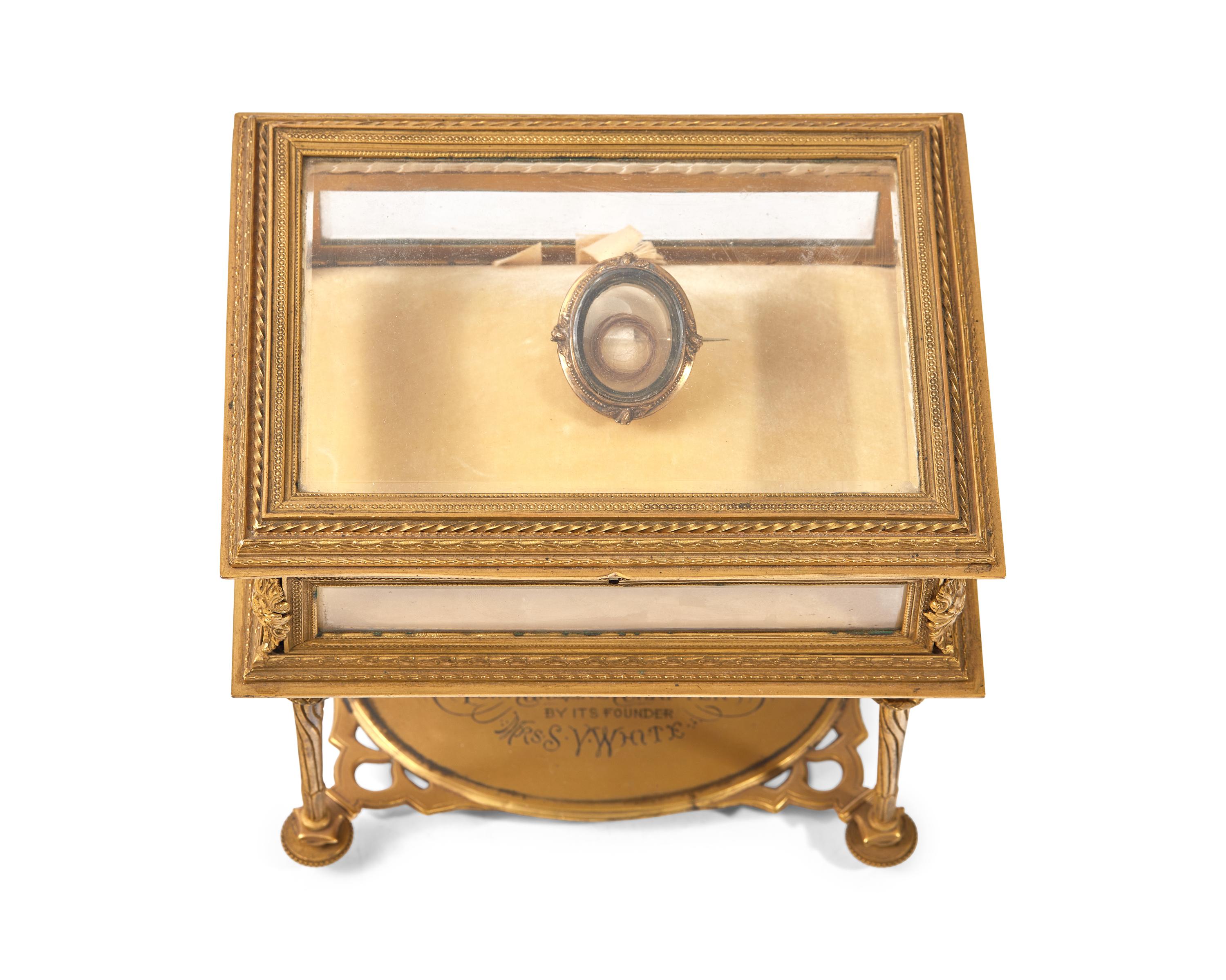 A Mourning Brooch With Hair Of George Washington Mounted In A Gilt Bronze And Glass Vitrine