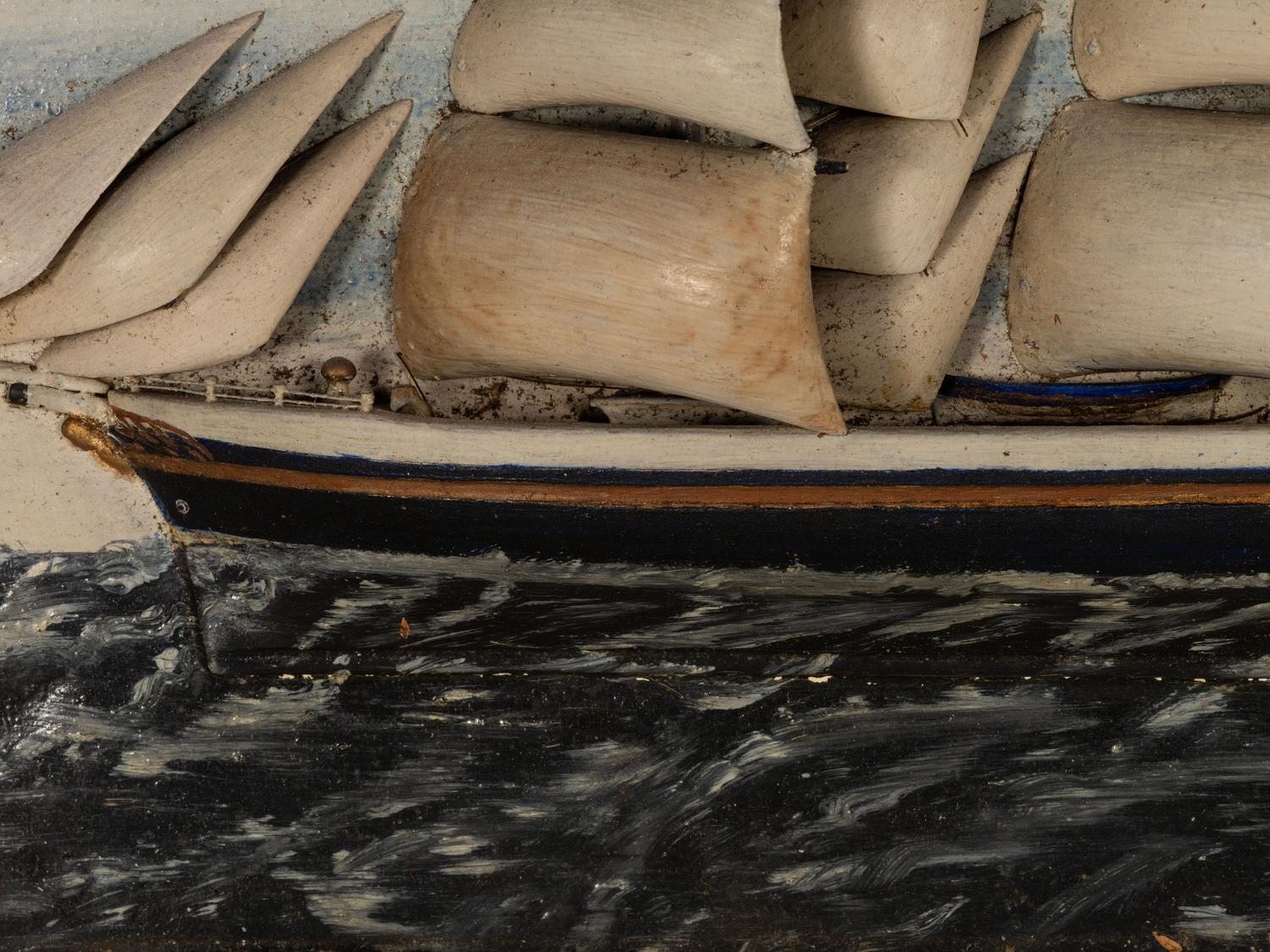 A Carved and Painted Wood Ship Diorama