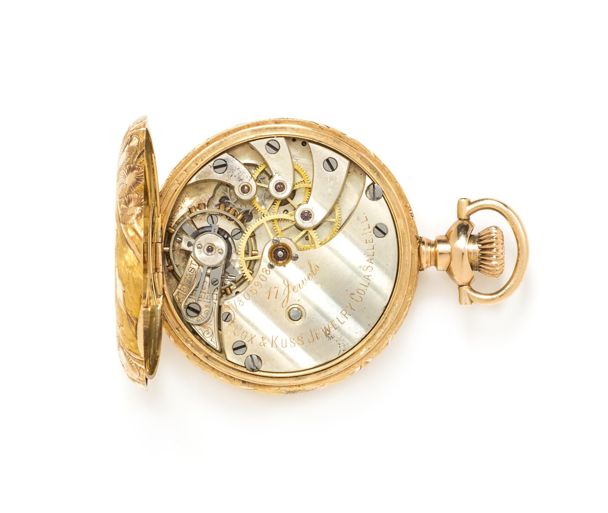A 14 Karat Yellow Gold Hunter Case Pocket Watch, Cox & Kuss Jewelry Co., 20.05 dwts.
