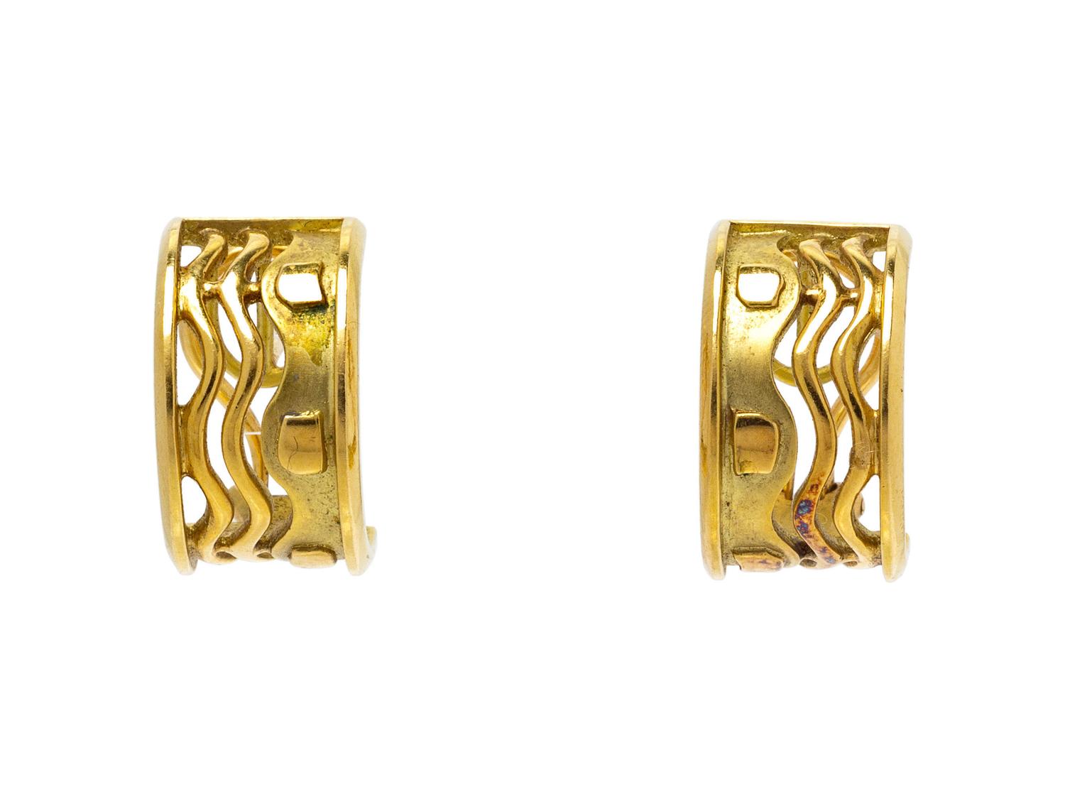A Pair of 18 Karat Yellow Gold Earclips, Bagues,