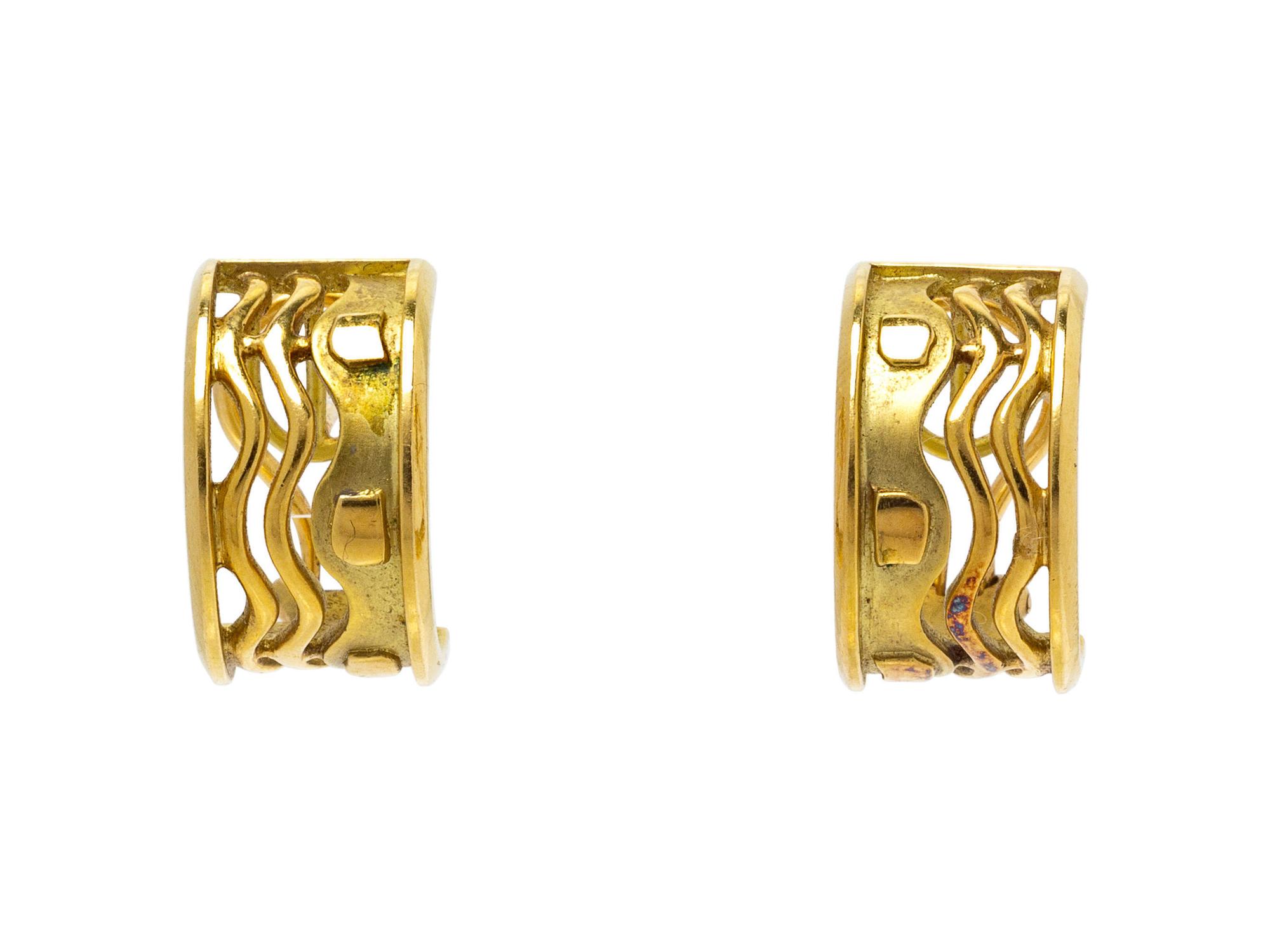 A Pair of 18 Karat Yellow Gold Earclips, Bagues,