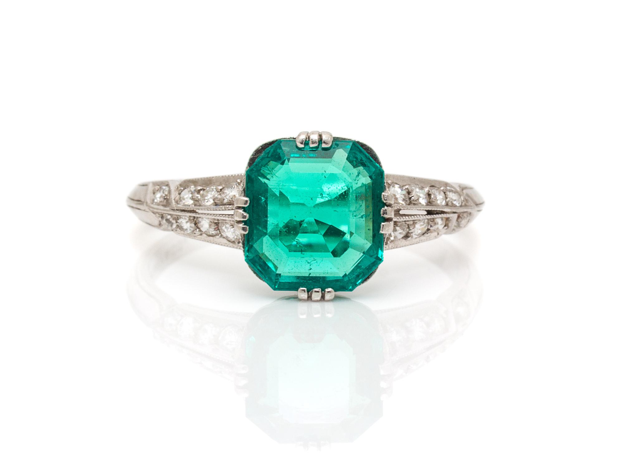 An Art Deco Platinum, Colombian Emerald and Diamond Ring, Tiffany & Co., 1.80 dwts.