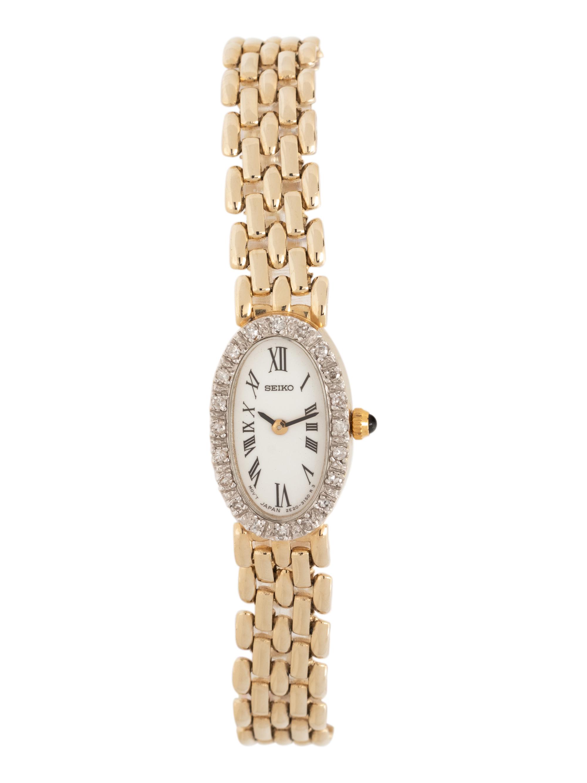 SEIKO, 14K YELLOW GOLD AND DIAMOND WATCH