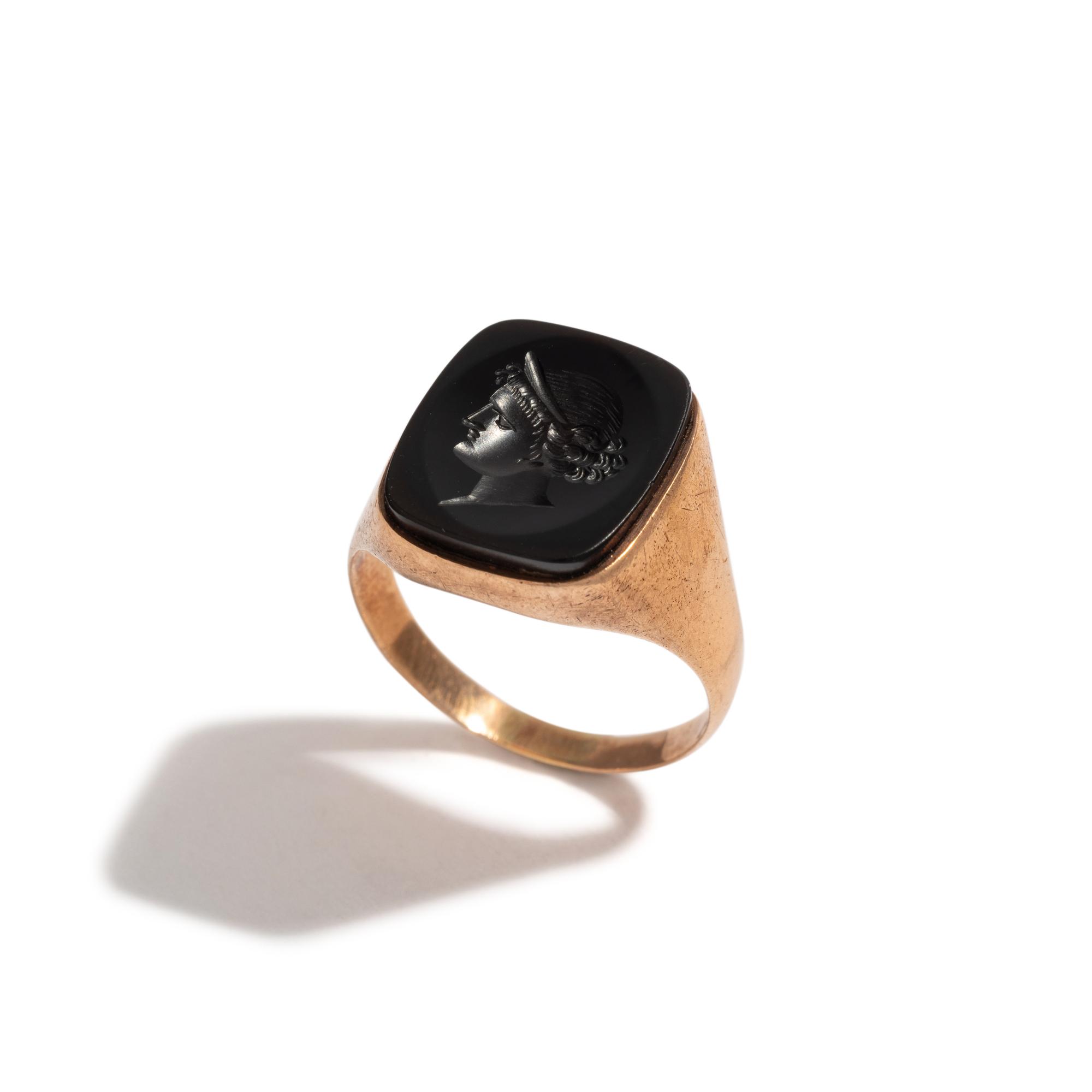 A Neoclassical Gold and Black Onyx Finger Ring with a Female Portriat — 'E.S.L 1893' engraved on the back of the ring