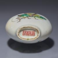A Chinese Enameled Porcelain "Crickets" Snuff Bottle, Daoguang Mark and of the Period — 清道光 粉彩蟈蟈圖鼻煙壺