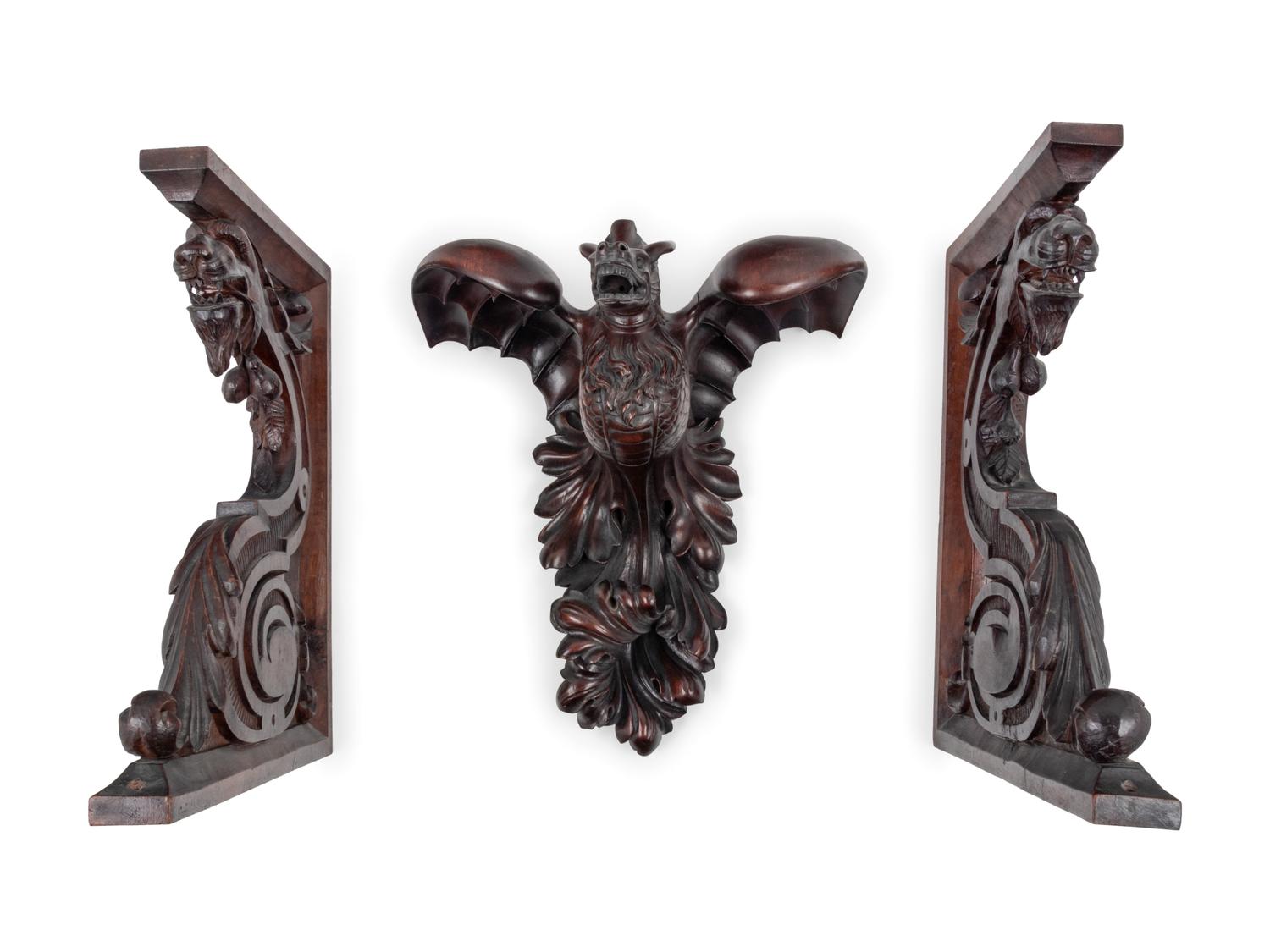 Three Continental Carved Walnut Griffin Form Brackets