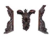 Three Continental Carved Walnut Griffin Form Brackets