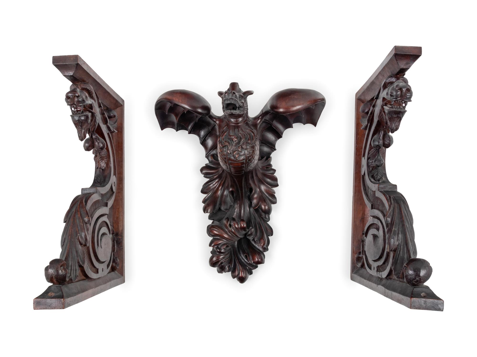 Three Continental Carved Walnut Griffin Form Brackets