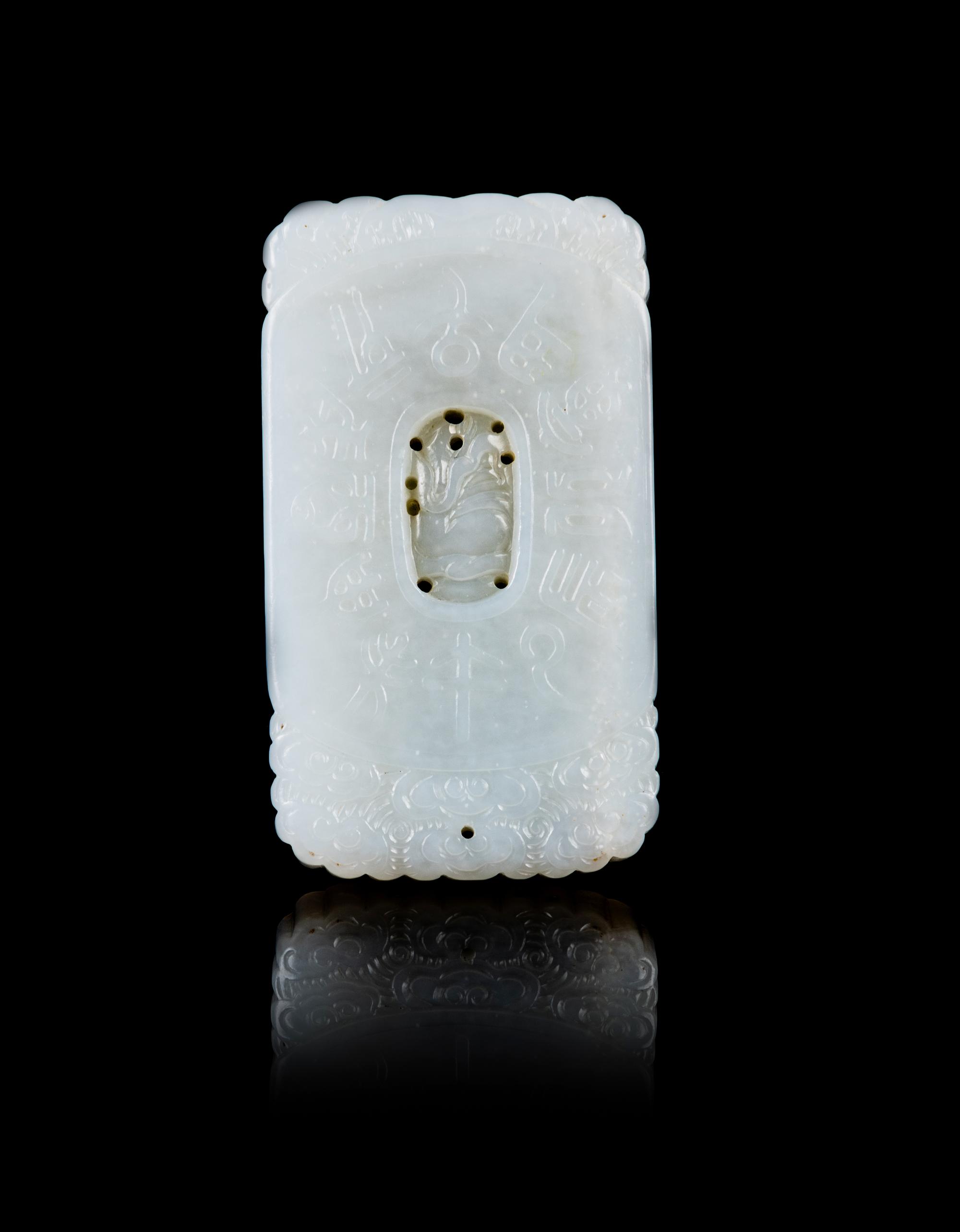 A Chinese White and Russet Jade Bi Disc