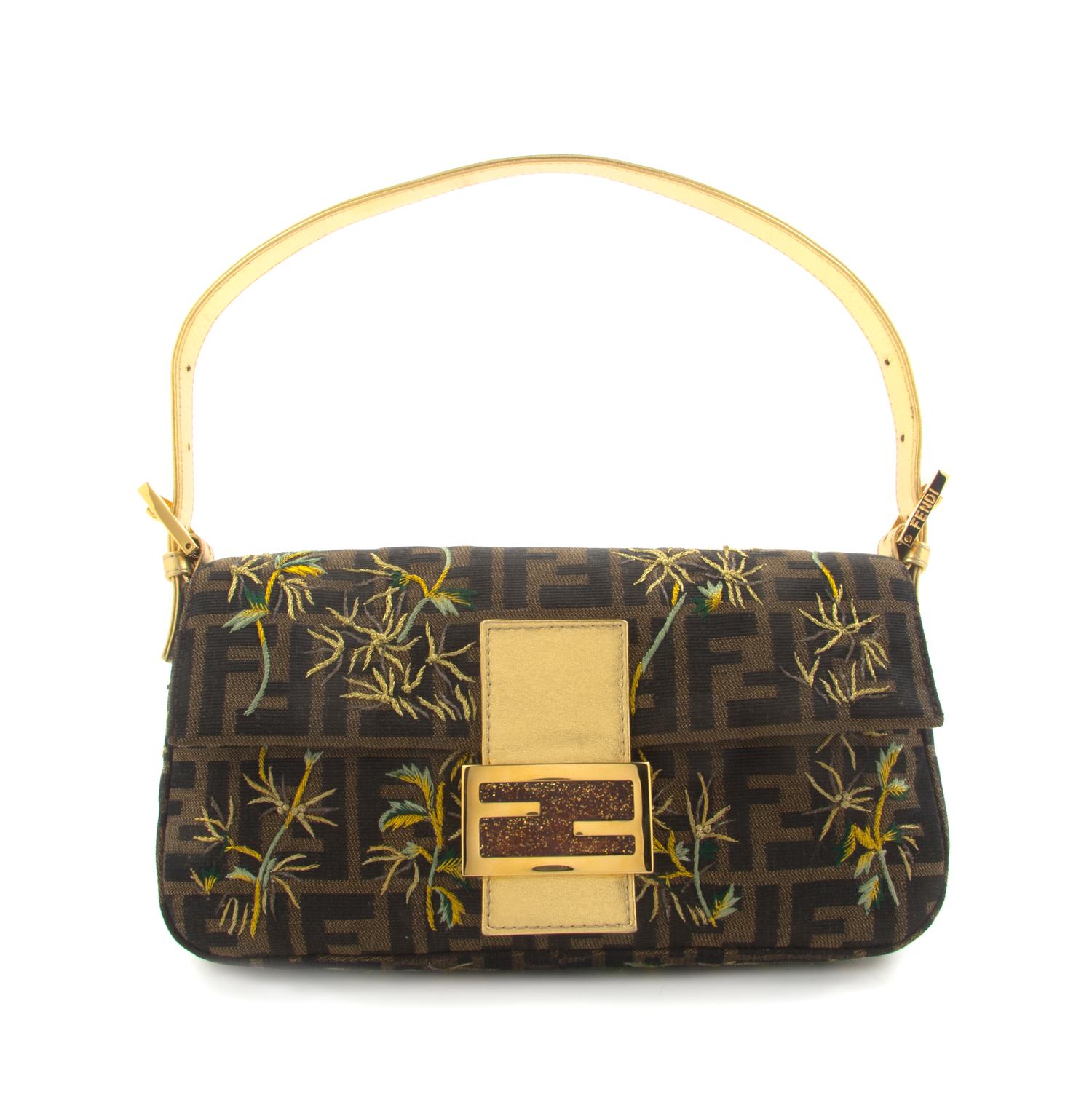 A Fendi Brown and Gold Monogram Pouchette, 10 x 5 x 1 1/2 inches.