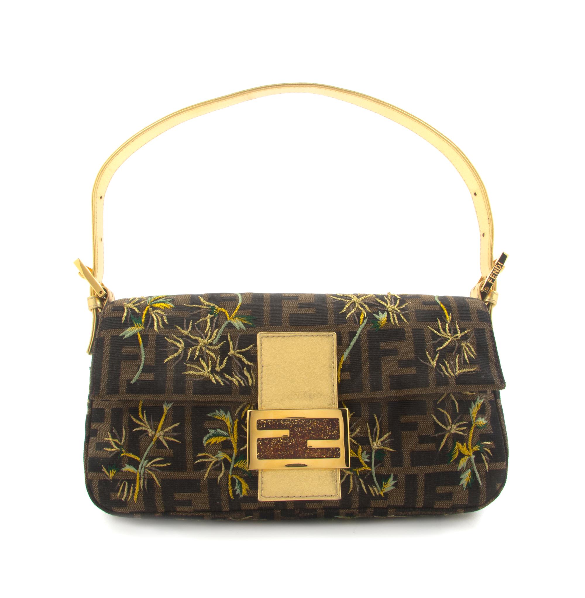 A Fendi Brown and Gold Monogram Pouchette, 10 x 5 x 1 1/2 inches.