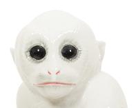 An Italian White Glazed Ceramic Monkey