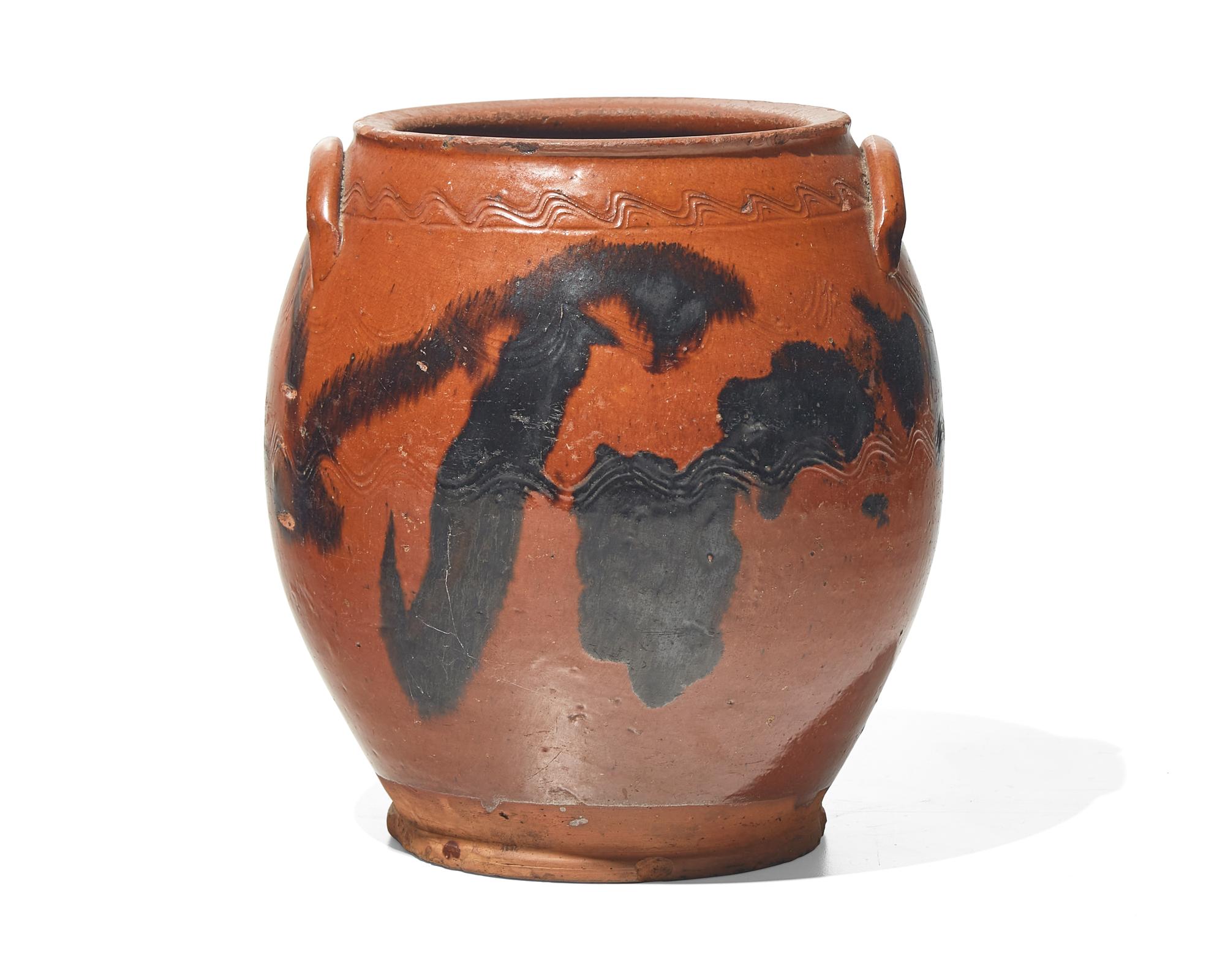 An Incised, Glazed, and Manganese-Splashed Redware Crock, 19th Century