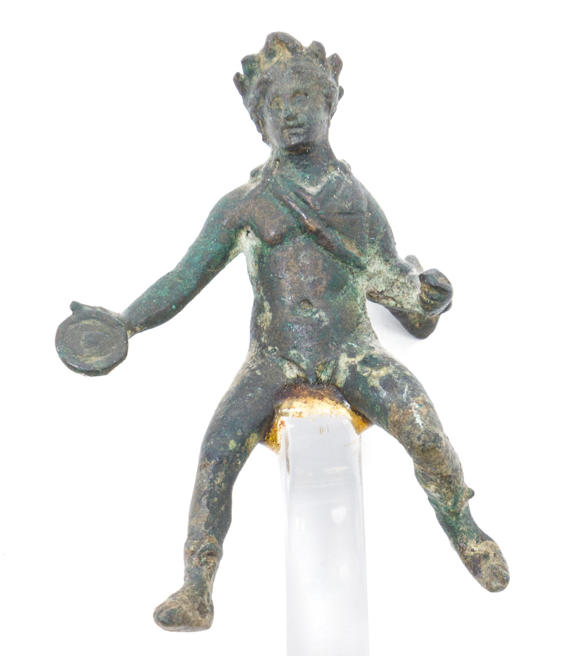 A Hellenistic Bronze Figure Height 2 3/4 x width 2 x depth 1 1/2 inches. — ASIA MINOR, CIRCA 200 B.C.