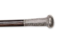 A Continental Silver Mounted Ebony Walking Stick
