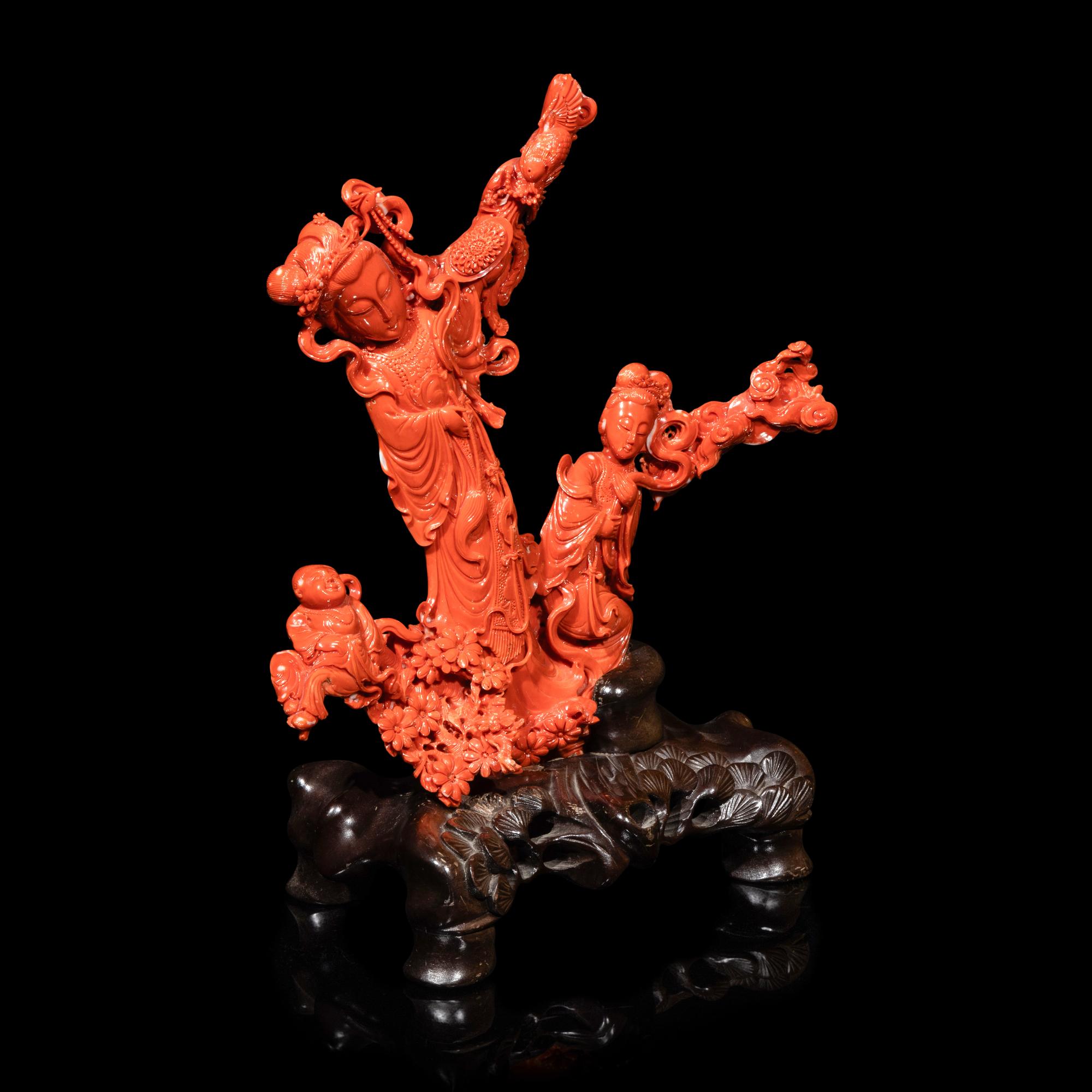 A Large Chinese Red Coral Carving, 20th Century 近代 紅珊瑚雕天女散花連木座