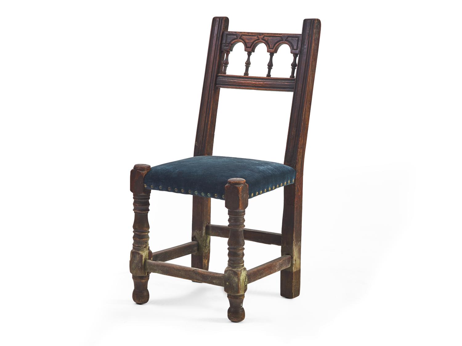 A set of Six Spanish Baroque Carved Walnut and Upholstered Side Chairs
