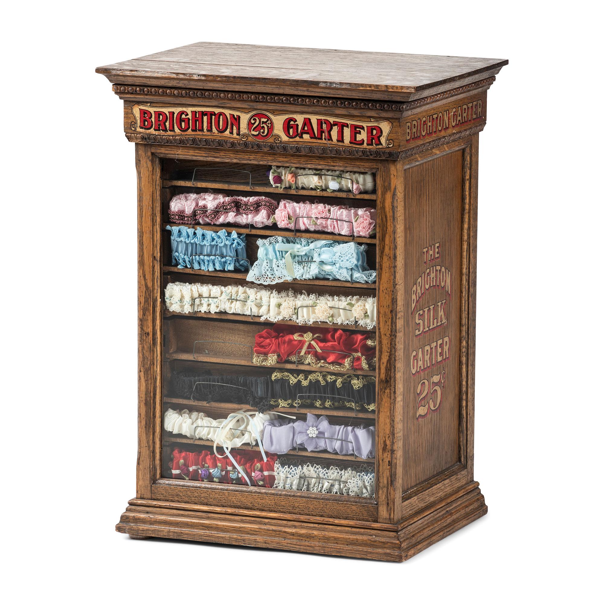 A Brighton Silk Garter Advertising Store Display Case