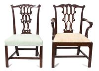 Two George III Carved Mahogany Chairs Height of armchair 38 inches. — 18TH CENTURY