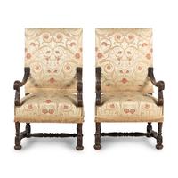 A Pair of Louis XIII Style Carved Oak Fauteuils