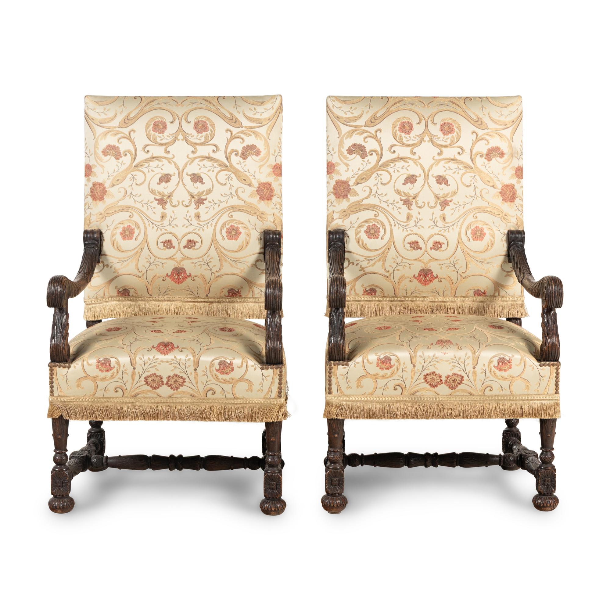 A Pair of Louis XIII Style Carved Oak Fauteuils