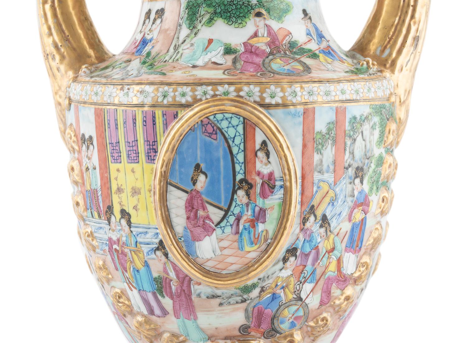 A Chinese Export Parcel Gilt Decorated Famille Rose Porcelain Pistol-Handled Urn