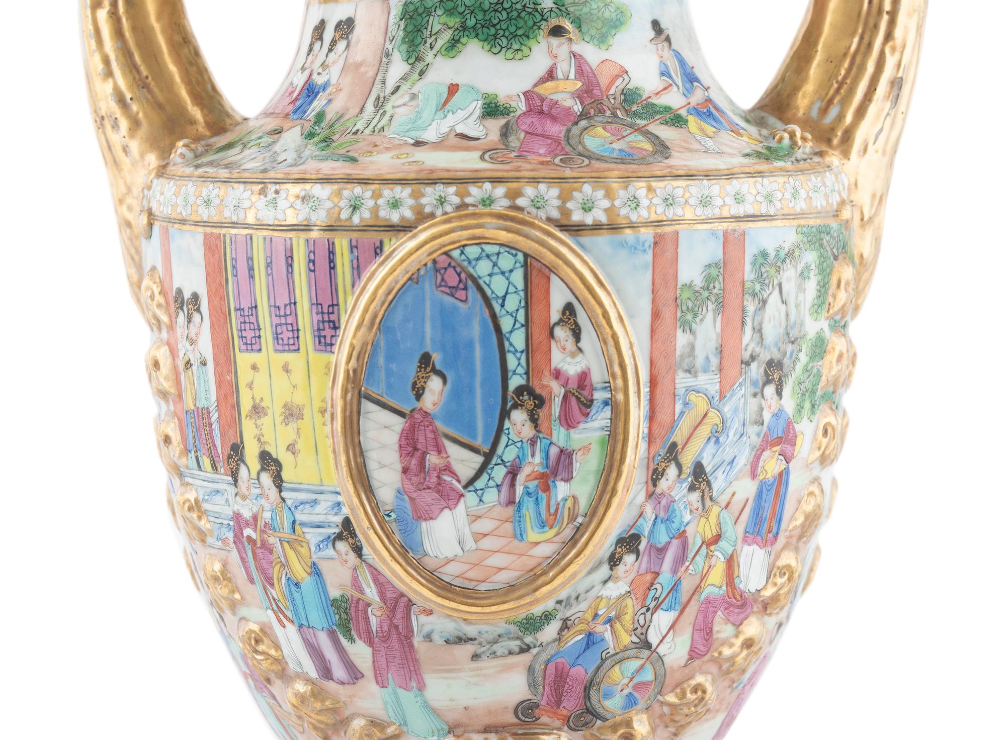 A Chinese Export Parcel Gilt Decorated Famille Rose Porcelain Pistol-Handled Urn