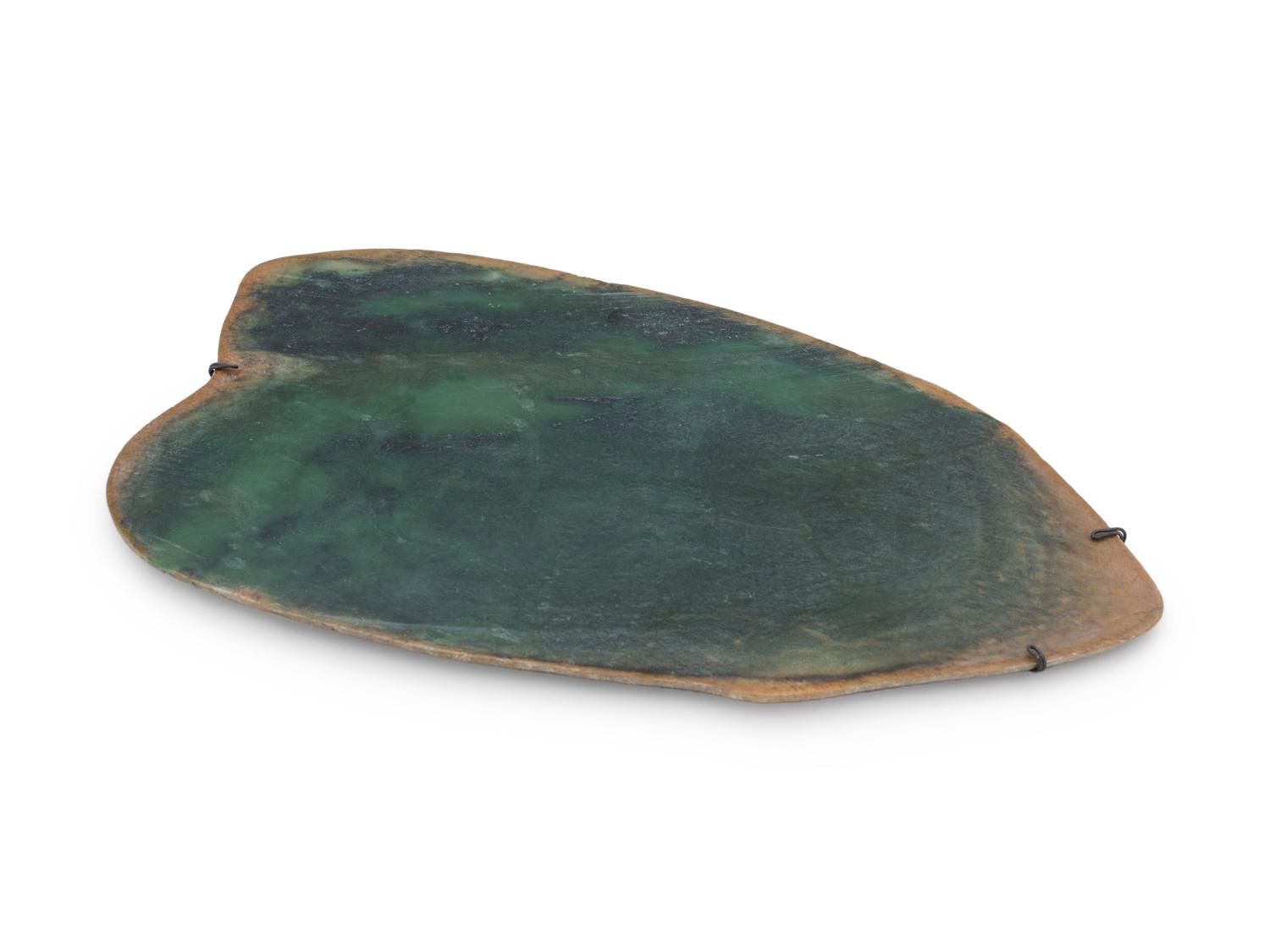 A Large Chinese Mottled Green Jade Plaque
