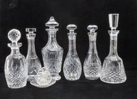 Six Waterford Cut Glass Decanters Height of tallest 13 inches. — 20TH CENTURY