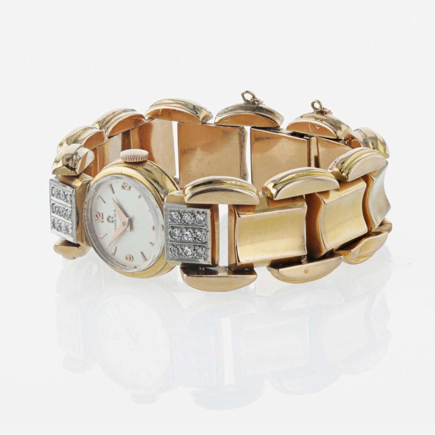 A diamond and gold watch, Omega Retro
